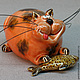 кот окарина рыжий