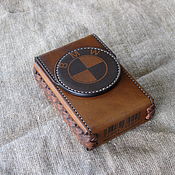 Leather case-keychain for a lighter with embossed symbols of the United States