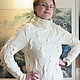 photo: Very nice, long women's knitted sweater in white.