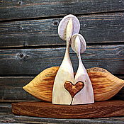 Angel on a boat. Guardian angel of childhood. Wooden composition