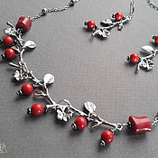Coral necklace. Red and black coral. Stylish decoration