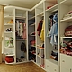 Spacious walk-in closet with open shelves and drawers. The difference in materials, size, color and filling is possible through manual work.