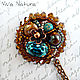 Brooch handmade with Swarovski crystals and natural pearls. Author jewelry. Turquoise, brown. Vintage style.