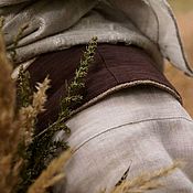 Коричневый кожаный ремень с плетельным узором