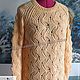 Photo. Knitted openwork sweater for women 
