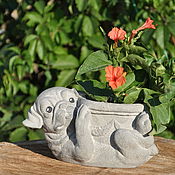 The average pot for flowers made of concrete with a pattern of Roses, Provence Vintage