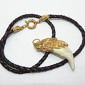 Украшения handmade. Livemaster - original item Pendant amulet Fang wolf gold plated on leather cord with wolves. Handmade.
