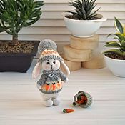 Knitted interior toy Hedgehog with Daisy in the yellow hat