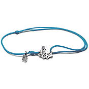 Amulet Hamsa with a blue cubic Zirconia, silver bracelet