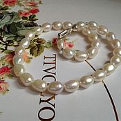 Jewelry sets: Set of Baroque pearls in gold