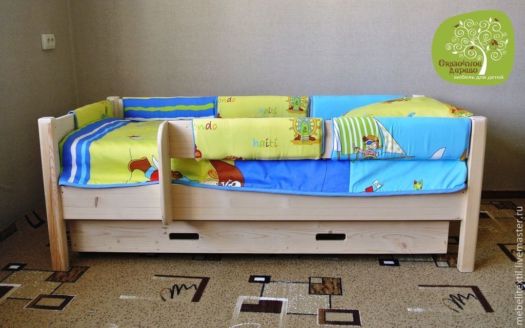 Детская кровать с защитным бортиком