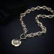 Chain with pendant made of genuine leather