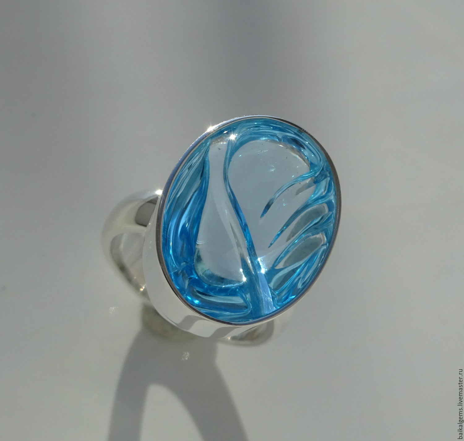 Кольца из голубого топаза