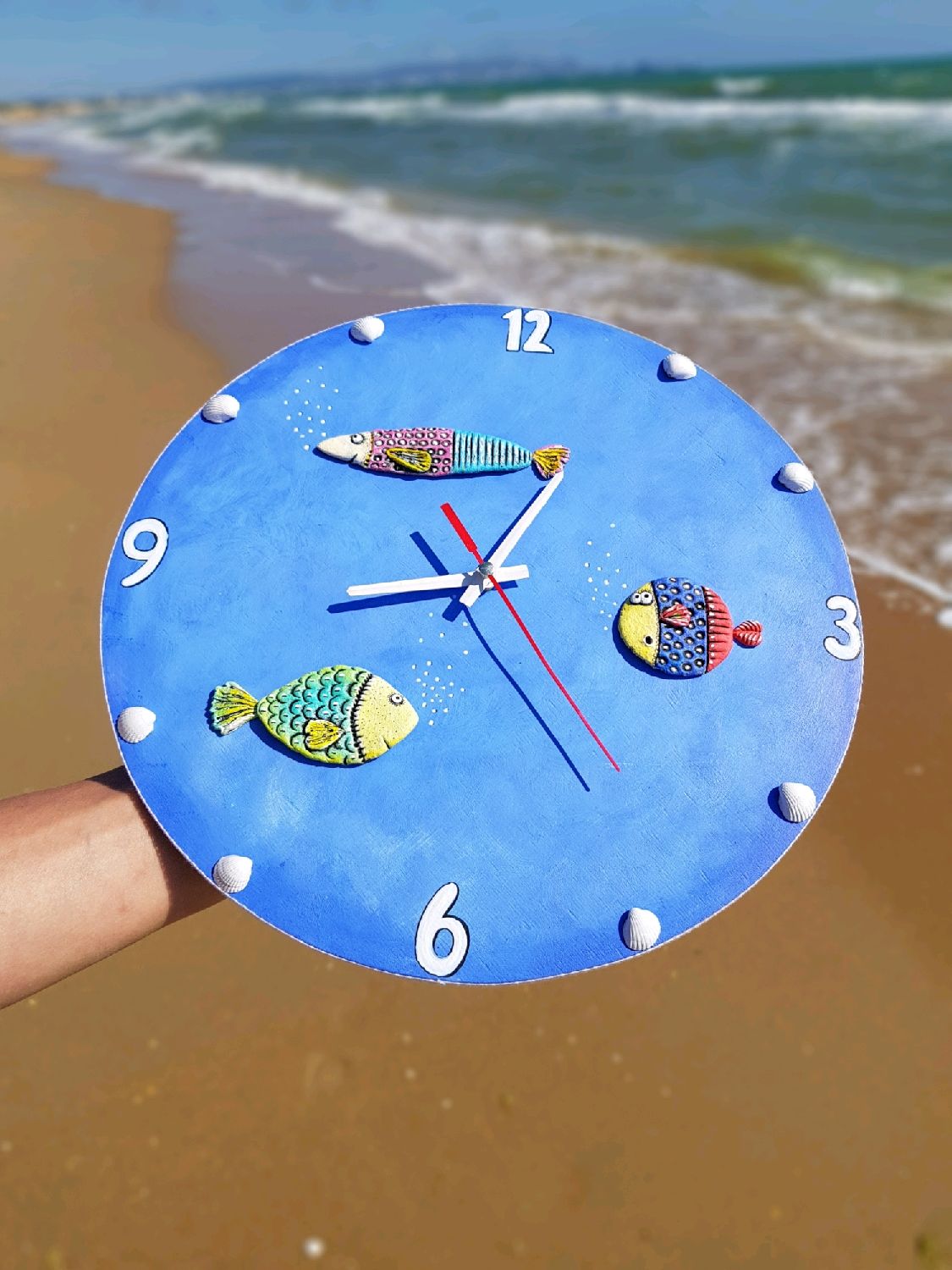 Часы рыба