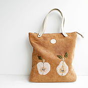 Textile bag with embroidery. The bag is summer female, leather