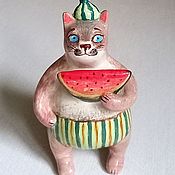 Ceramic cat with flower, No. 3