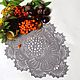 knitted doily, doily crochet, doily lace, doily delicate track on the table, autumn leaves.
