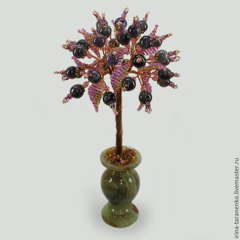 Tree amethyst `Amethyst color` in a vase of onyx
