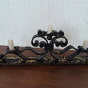 Wrought iron clothes hook. Double wall hook for clothes