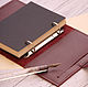Notebook leather A6 on the rings
