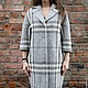 A unique development of our Studio coat which has an oversized silhouette going all . We offer sewing of high-quality Italian wool.
