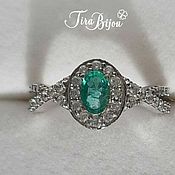 Silver ring with emerald and cubic Zirconia