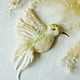 Decorate a scarf or your purse.Felted brooch ` Bird `made of wool ,decorated with beads,fibers, viscose,metallic sequins.
