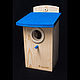 Wooden birdhouse for the birds `Baltika` with protective ring made of dry wood
