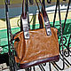 Heat brown handbag, very nice leather, with embossed cute dogs.
