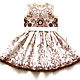 The author's combined dress for girls. Irish lace. 
