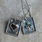 Earrings with emeralds, silver and brass