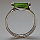 Ring with green tourmaline in silver `green light beam