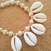 Украшения handmade. Livemaster - original item Bracelet made of cowry and wooden beads. Handmade.