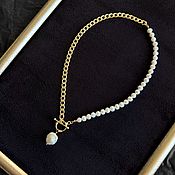 Asymmetric bicolor necklace with a heart 