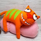 Soft toy red plush cat with changeable facial expressions