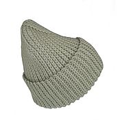 Аксессуары handmade. Livemaster - original item Knitted women`s hat with a lapel made of 100% wool.. Handmade.