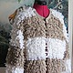 Photo: Chunky knit cardigan made of soft high quality yarn.