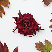 Rose brooch made of fabric 