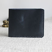 Leather money clip with a 