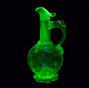 CANDLESTICKS PAIR. 2 pieces. Colored URANIUM glass. The beginning of the 20th century
