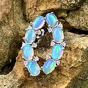 Sold. Set of silver jewelry with opal