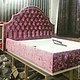 Дизайнерская кровать с фигурным изголовьем в каретной стяжке и декоративными гвоздиками