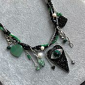 Black and emerald monocera with pearls and Swarovski crystal