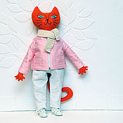 Toy kitty cat in clothes