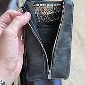 Triangular bag made of genuine leather