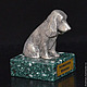 Miniature `Spaniel`. There are figurines of dogs of other breeds: Bichon Frise, Airedale Terrier, poodle, Dachshund, Pekingese. There are figurines of other animals: bear, elephant, turtle, cat, mouse