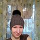 Серая вязаная шапка с косами и чёрным меховым помпоном. Шапки. LikeKnit. Ярмарка Мастеров.  Фото №4