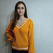 Women's knit jumper (pullover) made of wool brown braids