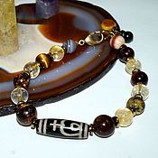 Amulet bracelet made of natural stones 