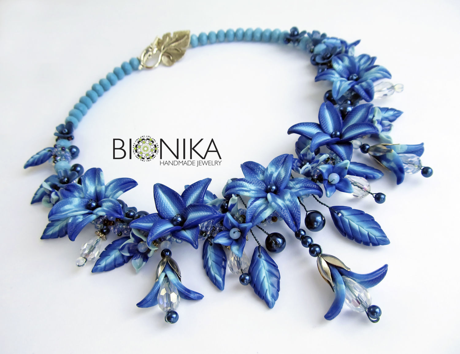 A beautiful pendant made of polymer clay will be an excellent decoration or souvenir for memory A beautiful pendant made of polymer clay will be an excellent decoration or souvenir for memory